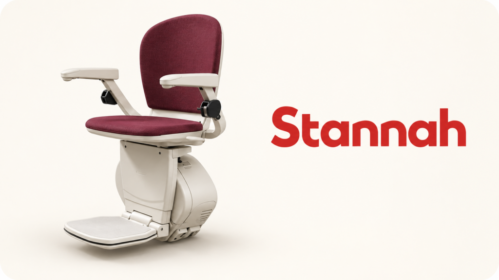 Stannah stairlift chair with burgundy upholstery and an ivory frame beside the red Stannah brand name.